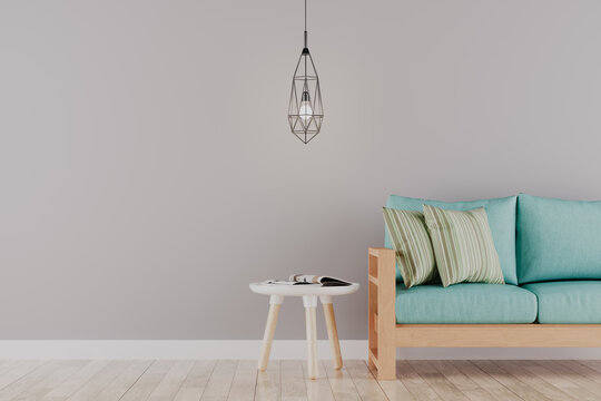Renderiza&ccedil;&atilde;o 3d de detalhes de uma sala de estar com parece cinza e sof&aacute; azul. Super aconchegante e confort&aacute;vel