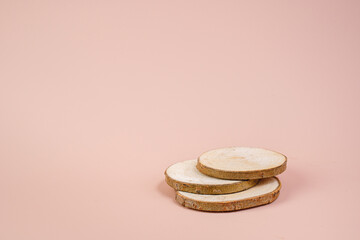 Podium for your product. Advertising banner. Spioa tree on a pink background. Place for text.