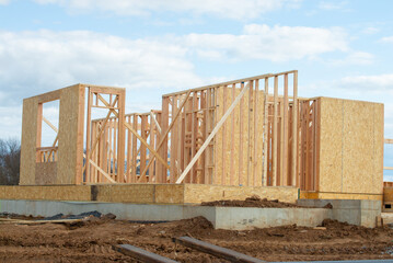 interior framing of a new house under construction new construction home framing