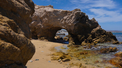 Fototapeta na wymiar Rock arch on a beach in Los Cabos, Mexico