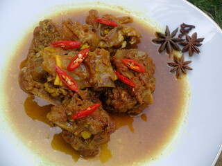 Indonesian food made of lamb meat and bone. It's very famous food in Indonesia. Tongseng kambing. lamb curry with soy sauce. 