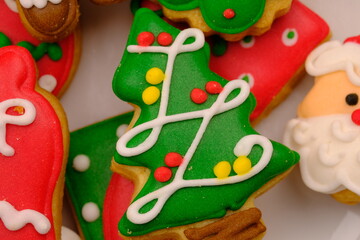 tasty Christmas cookies on a white ceramic plate. delicious colorful Christmas cookies. kue kering natal.