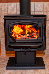 Fireplace with a roaring fire inside