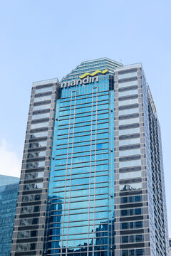 Exterior view of the building and logo of the state-owned enterprise Mandiri Bank in Sudirman Central Business District (SCBD). Jakarta - Indonesia, 06 13 2021