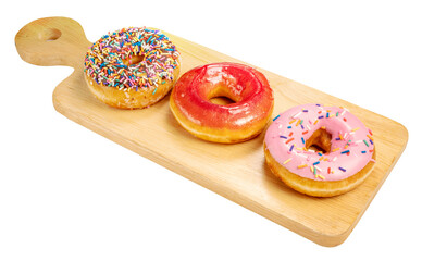 Mixed donuts, original flavor, chocolate, marmalade and fancy toppings on wooden plate on wooden background on white PNG File