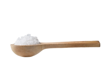 Coarse sea salt heap in a wooden spoon isolated cutout on transparent