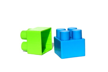 A pile of children's bright toy constructor on a white isolated background.