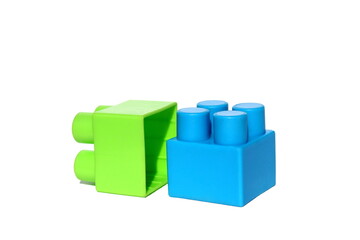 A pile of children's bright toy constructor on a white isolated background.	