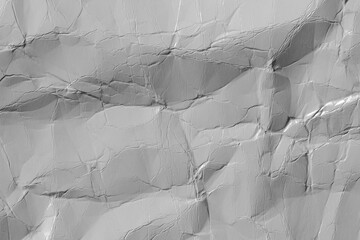 Abstract texture of crumpled gray paper with folds.