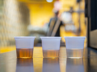 Close up shot of three different aged Tequila wine