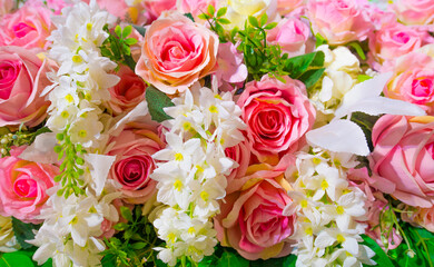 A bouquet of pink roses and many colors.