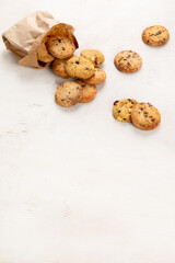 National Cookie Day with yummy freshly chocolate chip cookies on a white background. Top view.