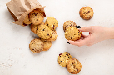 National Cookie Day with yummy freshly chocolate chip cookies on a white background. Top view.