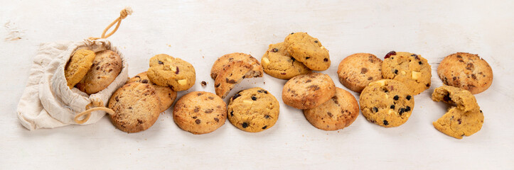 National Cookie Day with yummy freshly chocolate chip cookies on a white background. Top view.