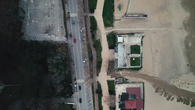 Aerial zenithal shot of the sea frontline and beaches of Pescara on the Adriatic Coast in Italy with a 4K drone