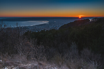 Panoramic sunset high above the sea.