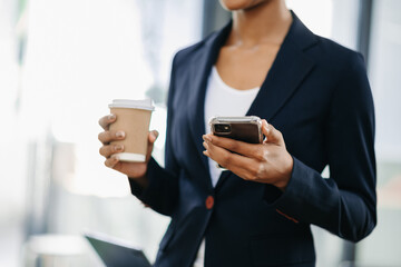 businesswoman hand using smart phone, tablet payments and holding credit card online shopping, omni channel, digital tablet docking keyboard computer