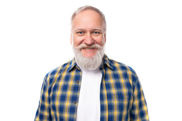 Fototapeta premium mature gray-haired retired man with a mustache and beard with a kind smile on a white background