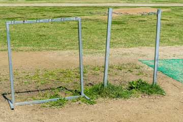 Fototapeta na wymiar Aluminum baseball racks at urban public park.