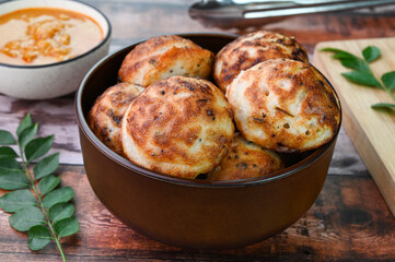 Indian breakfast kuzhi paniyaram served in a bowl