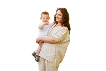 Mother holds a happy toddler boy boy in her arms, isolated on a white background. Mom with a smiling baby in white clothes, one year old kid