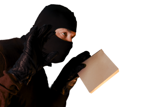 A thief wearing a ski mask picks up a box with a parcel from a warehouse at night, isolated on a white background - Powered by Adobe