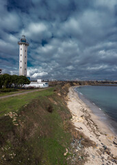Fototapeta premium Aerial view to a lighthouse on the coast
