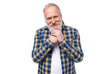 portrait of a kind retired handsome 60s middle-aged gray-haired man with a beard in a shirt on a white background