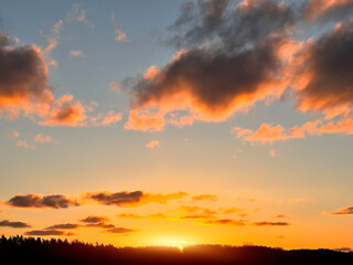 Sunset sky The sunrise is decorated with clouds in various shapes