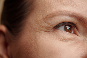 Eye wrinkles of middle-aged woman, skincare and rejuvenating therapy concept - obrazy, fototapety, plakaty
