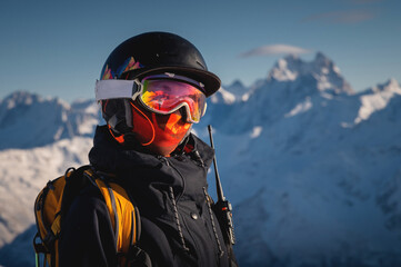 Fototapeta na wymiar Skier smiling happy cheerful satisfied woman in warm windbreaker jacket ski goggles mask glasses spend extreme weekend in mountains on resort