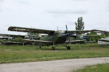 abandoned damaged soviet union military airplane Antonov An-2