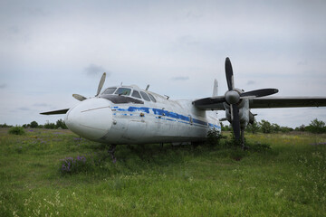 abandoned damaged russian military airplane Antonov An-24
