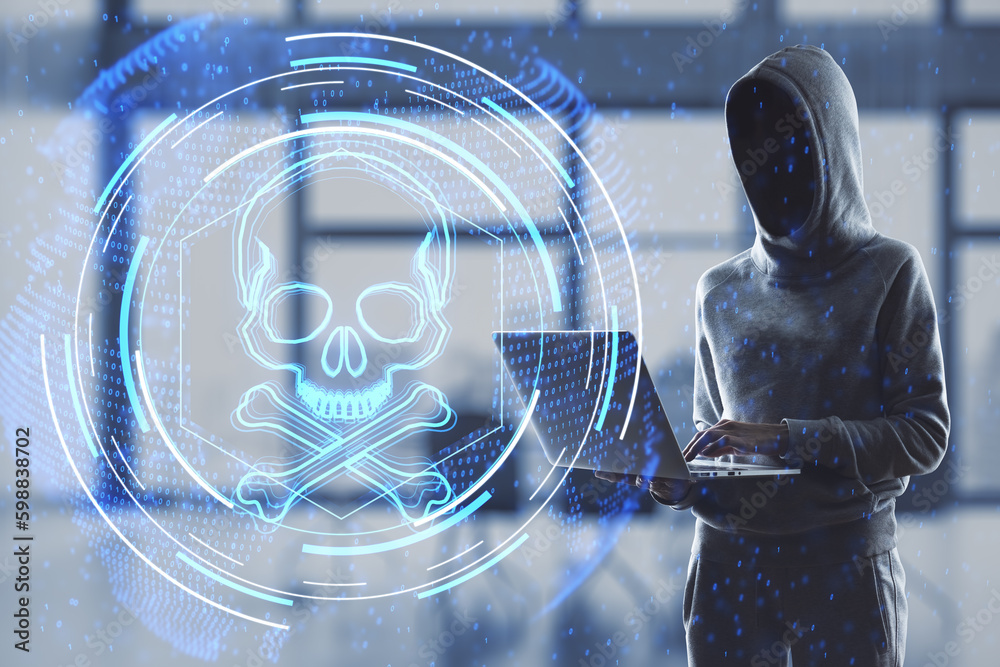 Aufkleber Hacker using laptop with abstract glowing skull hologram on blurry office interior background. Hacker system or cyber attack concept. Double exposure.