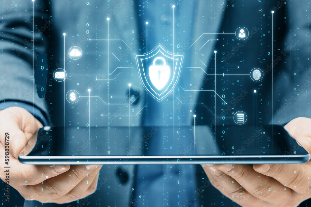Leinwandbilder close up of male hands holding tablet with glowing blue padlock shield with digital coding on dark b