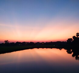 sunset on the river beautiful reflection