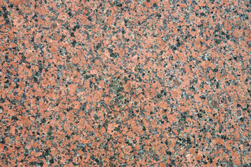 Red granite with black spots
