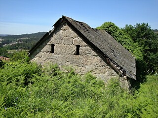 Fototapeta na wymiar Typical stone house in rural regions in Northern Portugal 