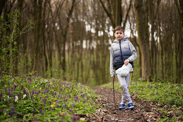 Portrait of boy on forest. Outdoor spring leisure concept.