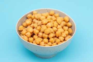 Ceramic bowl full of chickpeas, boiled and drained