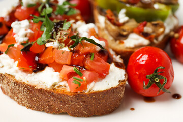 Toasts with tasty grilled vegetables, concept of delicious appetizer