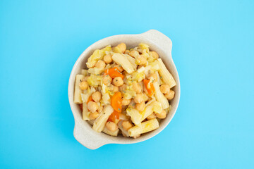 Cooked chick peas with cabbage, carrot in bowl