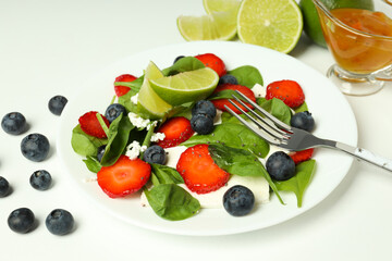 Obraz na płótnie Canvas Concept of tasty food, salad with strawberry