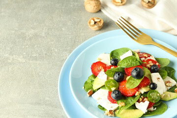 Concept of tasty food, salad with strawberry, space for text