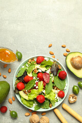 Concept of tasty food, salad with strawberry, space for text