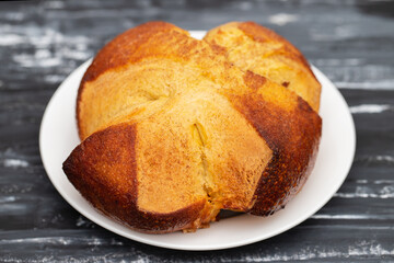 Fresh portuguese Easter folar on white dish