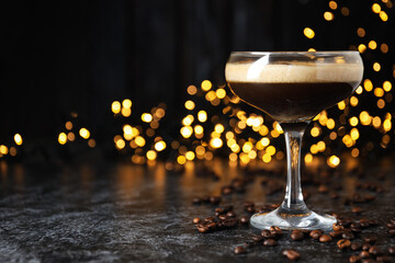 Espresso martini cocktail, delicious alcohol drink, space for text