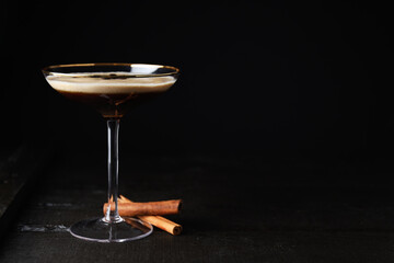 Espresso martini cocktail, delicious alcohol drink, space for text