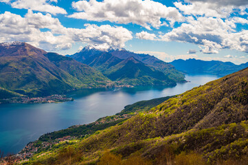 View of Lake Como, towards the south, from the church of San Bernardo in Musso, with the mountains above, Dervio, the streets and the villages bordering the lake.
