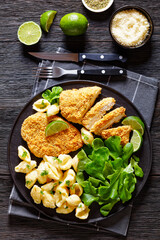 breaded chicken fillet with alfredo pasta shells